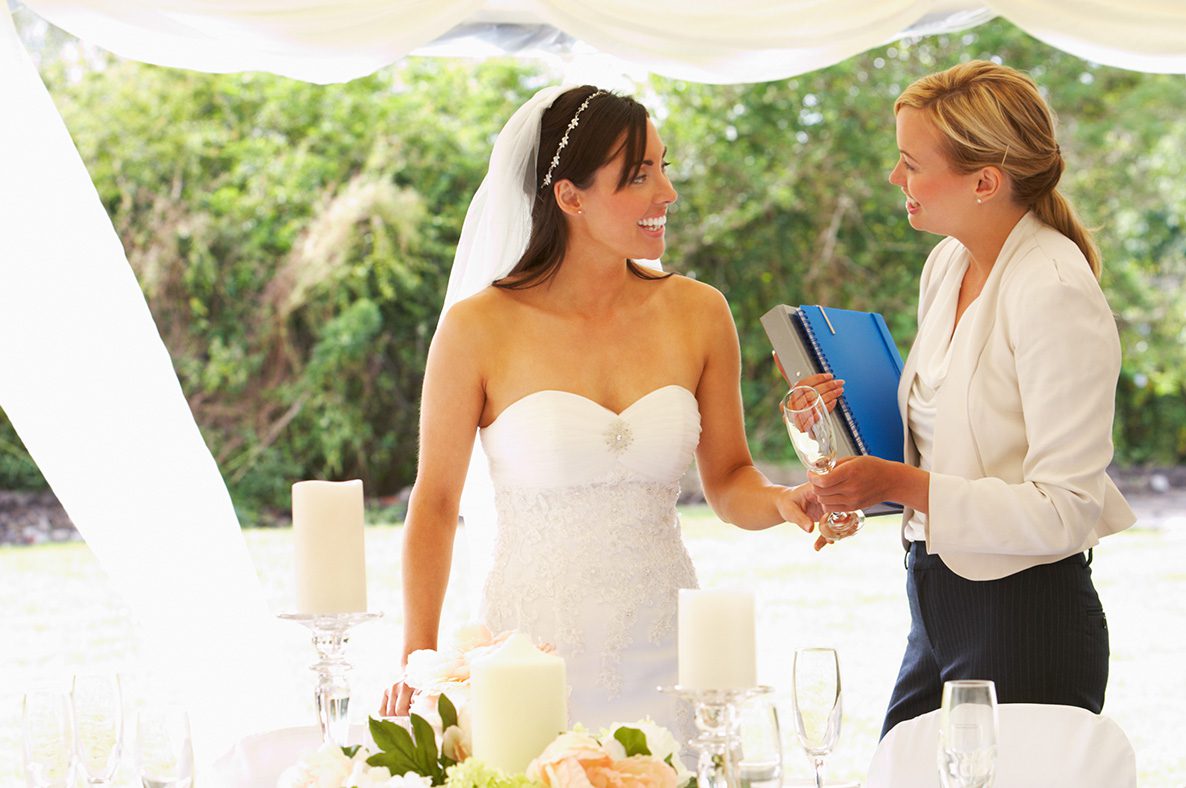 Image of a bride with a wedding planner